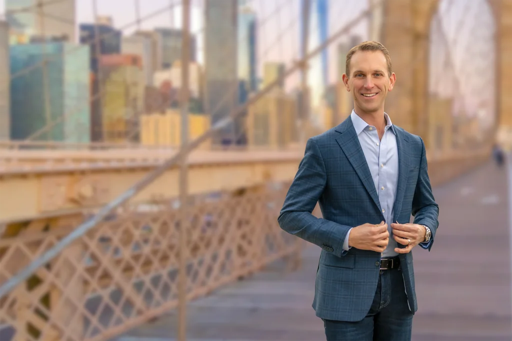 Nice photo of Andrew standing on a bridge in New York